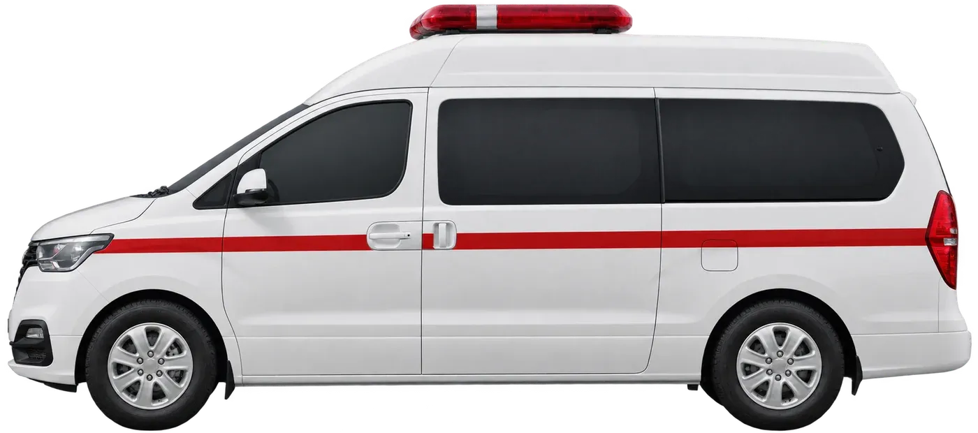 붉은 띠가 둘린 흰색 밴형 사설 구급차 측면